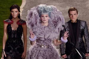 katniss on the left, effie in the middle, and peeta on the right