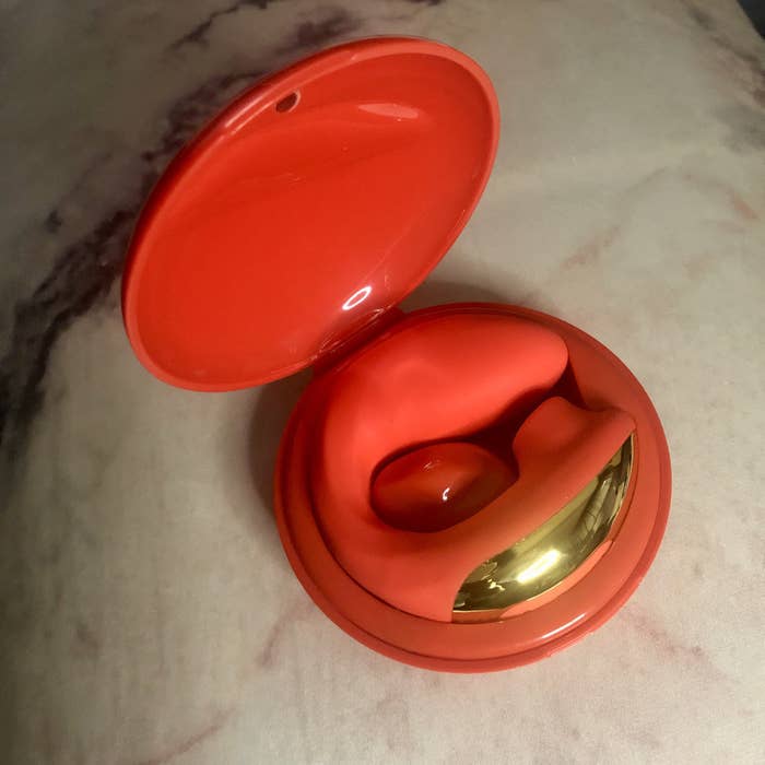 Red and gold vibrator in case