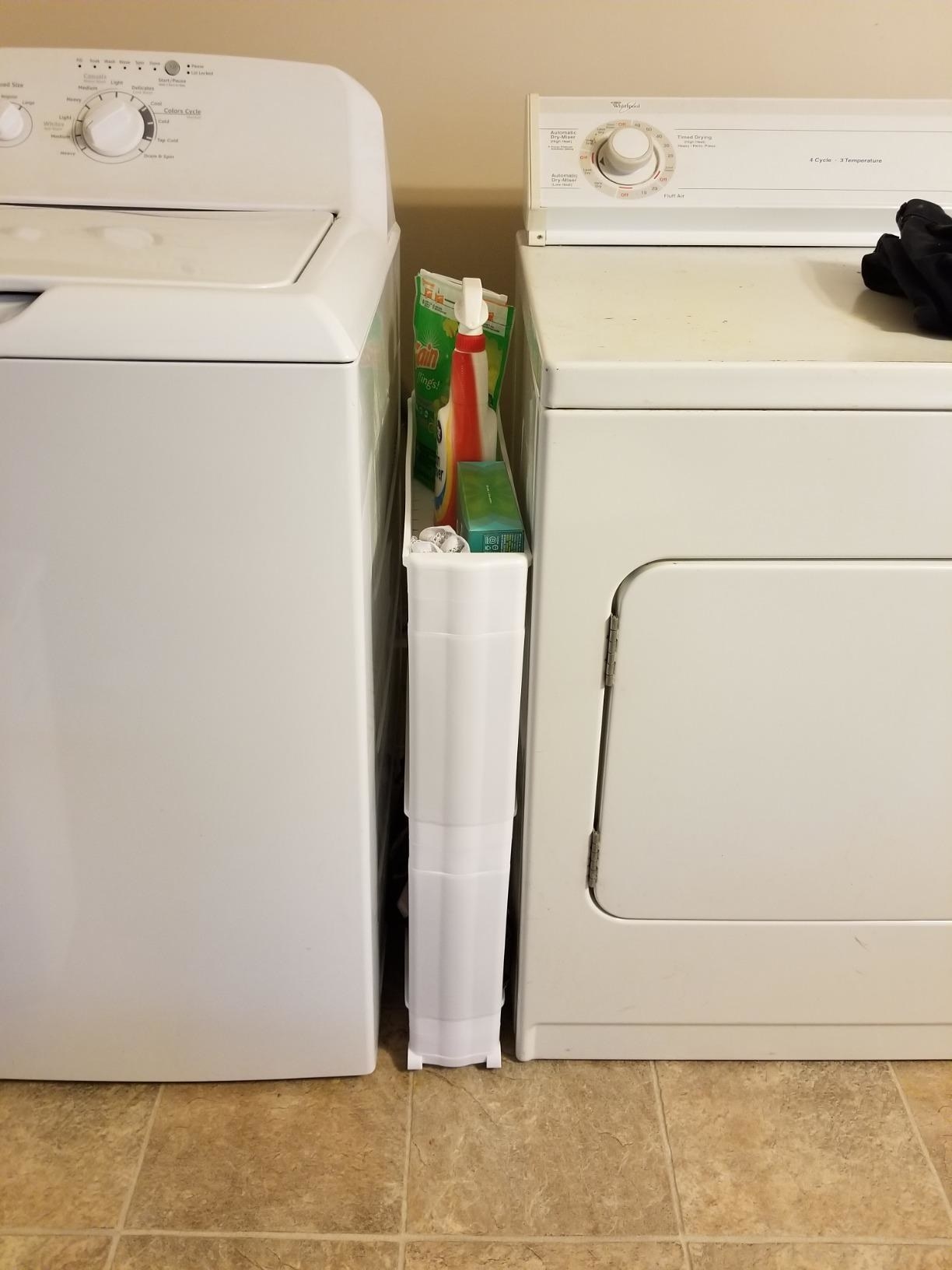 a review photo of the cart between a washer and dryer