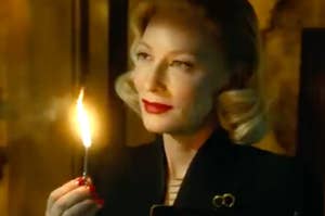 Cate Blanchett holding a match
