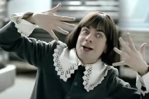 The Little Lad from the Berries and Cream commercial opening his eyes wide and placing his hands next to his face