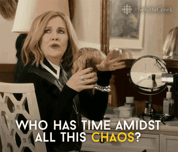 Moira from &quot;Schitt&#x27;s Creek&quot; waving her nails and saying, &quot;Who has time amidst all this chaos?&quot;