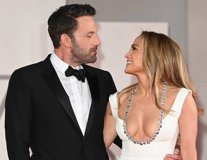 Ben and Jennifer gaze and each other with their arms around one another at a recent red carpet