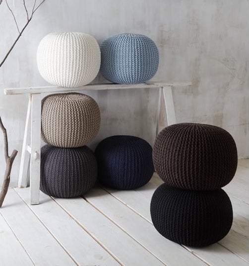 collection of round knitted poufs