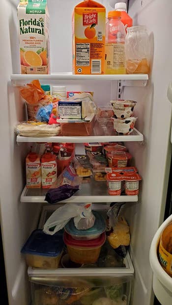 before photo of a reviewer's fridge, which is cluttered with food