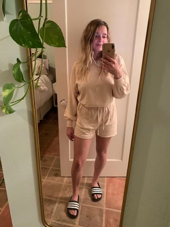 a reviewer in the long sleeve and short set in tan