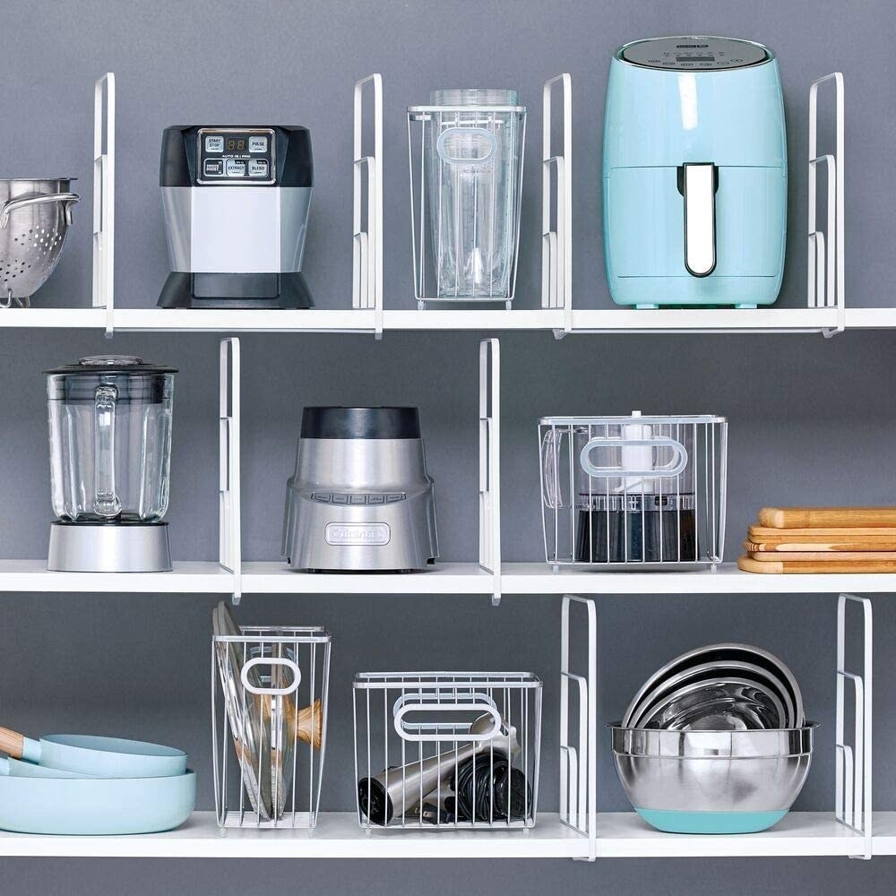 a kitchen shelf holding small appliances, all divided by the shelf dividers