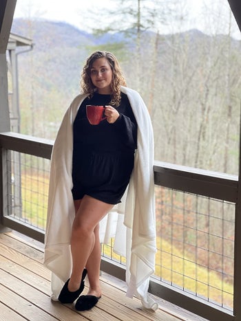 a reviewer in the set in all black