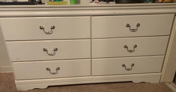 the same dresser after it was cleaned with the pink paste and almost all of the black marks are gone and the remaining marks are hard to notice