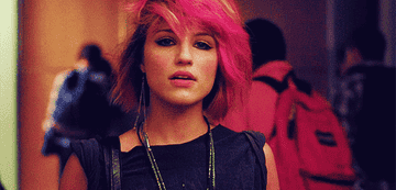 Quinn with bright pink short choppy hair