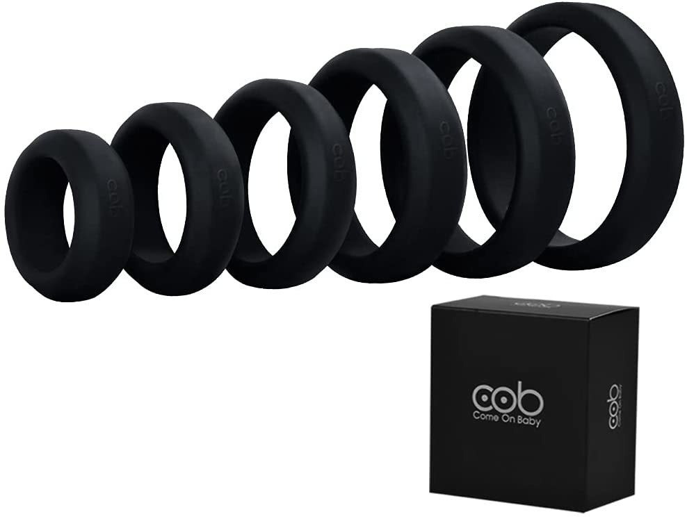 Six black cock rings arranged by size