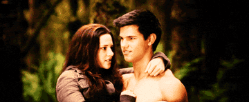 Jacob smiling and carrying Bella in &quot;Eclipse&quot;