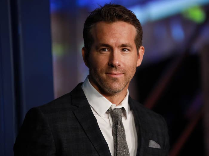 Ryan wears a suit while attending an event
