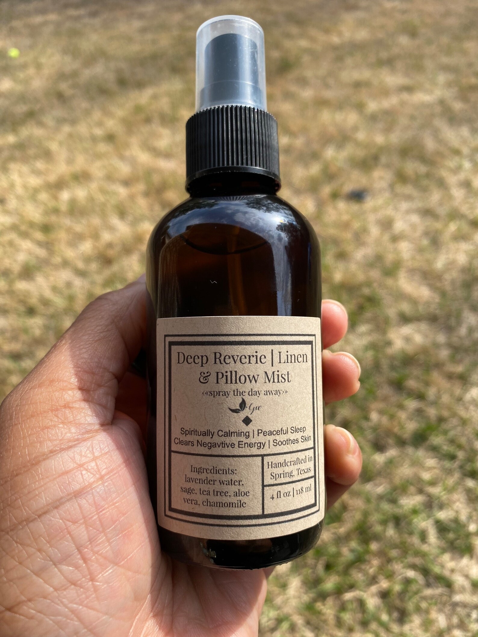 The pillow spray in a glass bottle