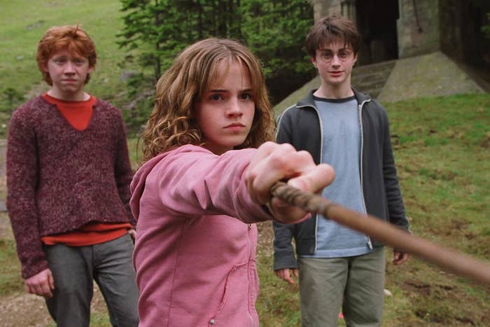 Hermione pointing her wand