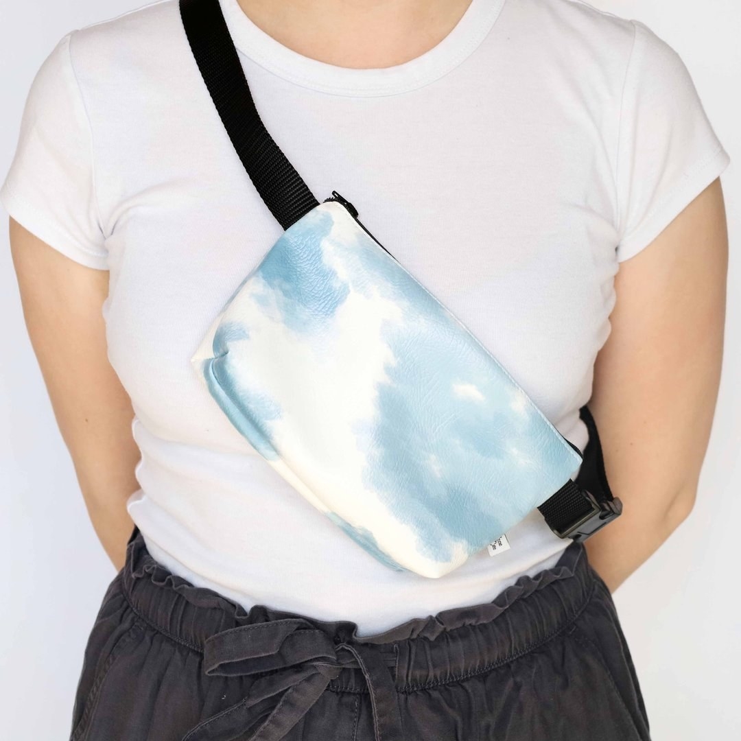 model wearng cloud nine belt bag across their chest
