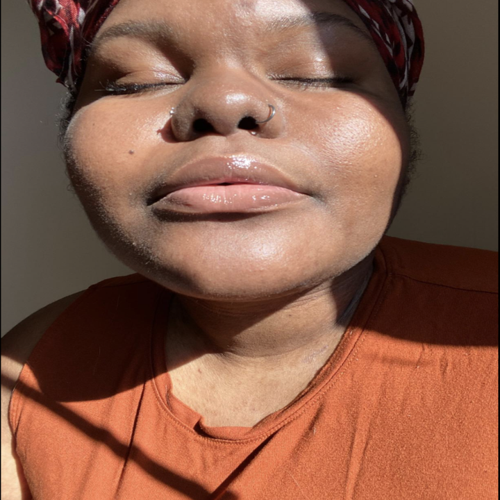 Reviewer with lip gloss on their lips