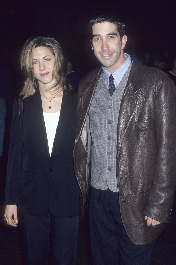 Jennifer and David standing together and wearing jackets