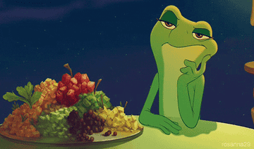 a gif of tiana as a frog looking bored