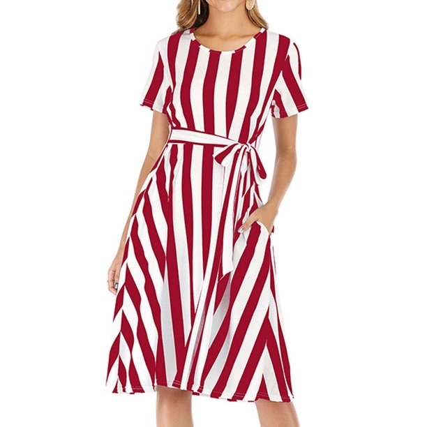 a model wearing the red and white striped dress