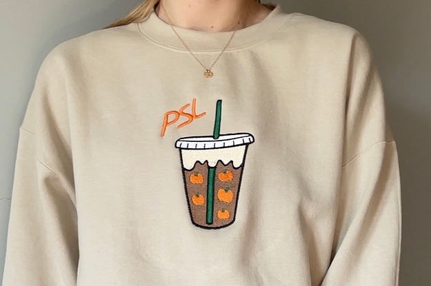 a model wearing the pumpkin spice latte sweatshirt