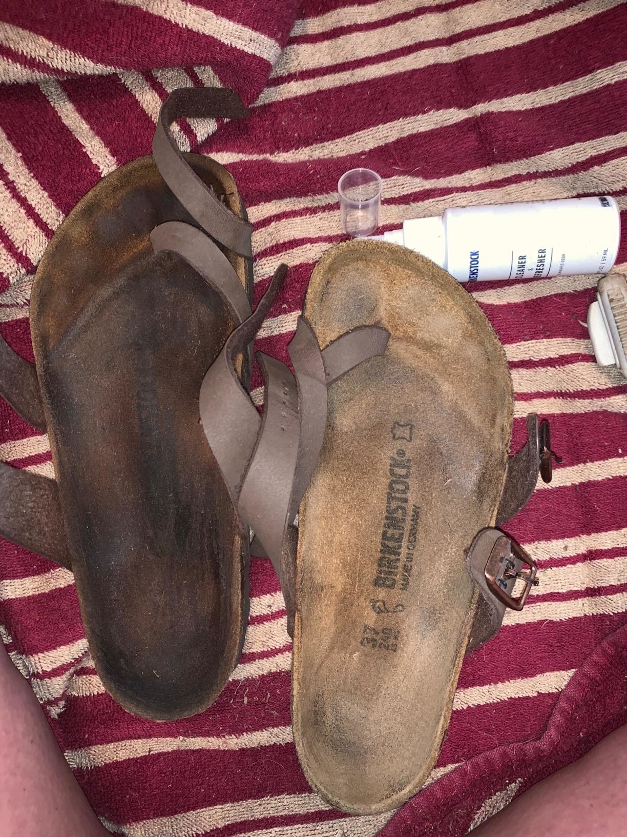 reviewer&#x27;s birkenstock very dirty and stained dark, and then a cleaned birkenstock on the right