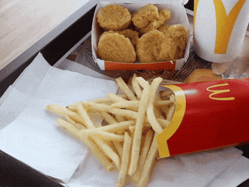 a hand slapping another hand away so they don&#x27;t have to share their fries