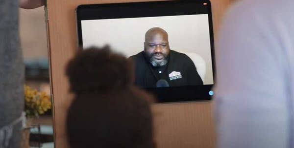 Shaq on an iPad screen taped to a pizza box