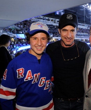 son Clyde in a Ranger&#x27;s jersey