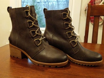 a reviewer photo of the boots in brown sitting on a table 