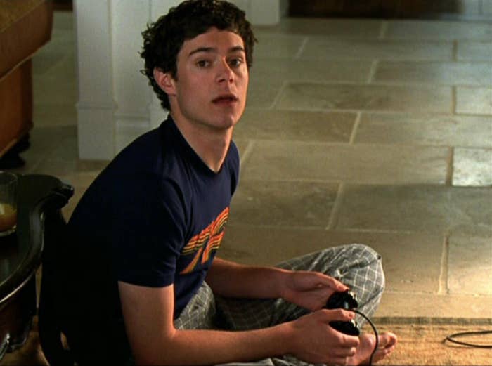 Seth playing video games in pajamas in the pilot