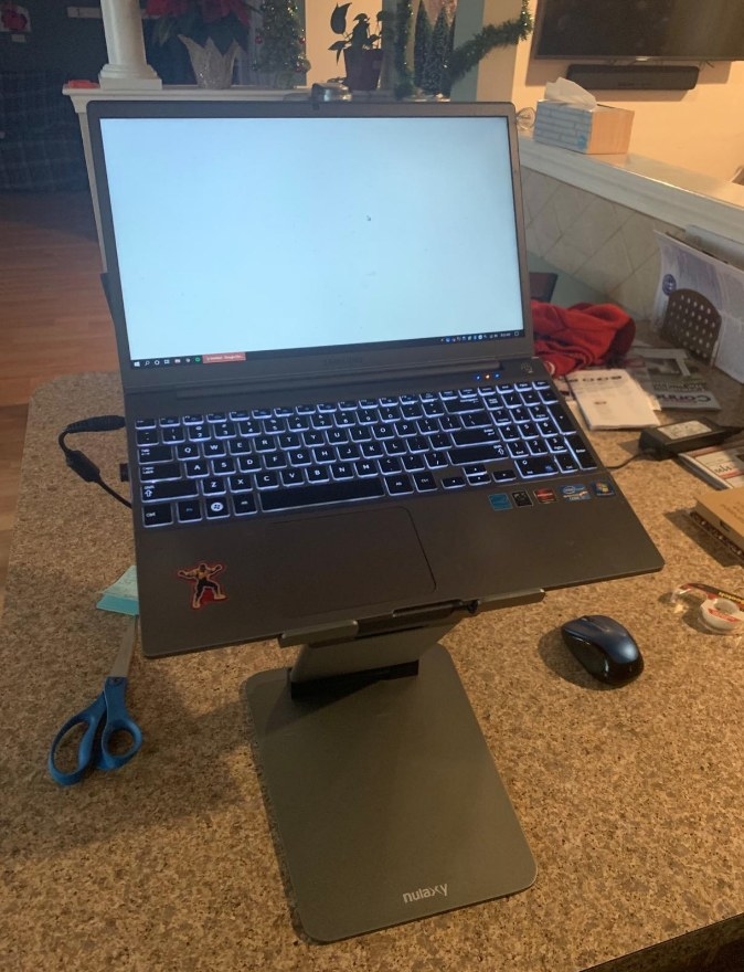 Laptop on laptop stand