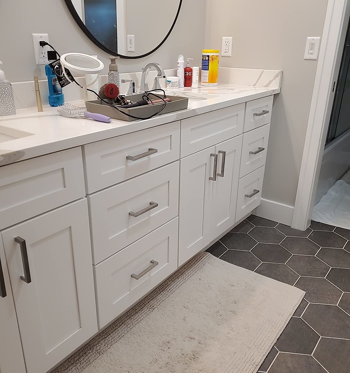 Reviewer photo of the handles installed on a bathroom vanity