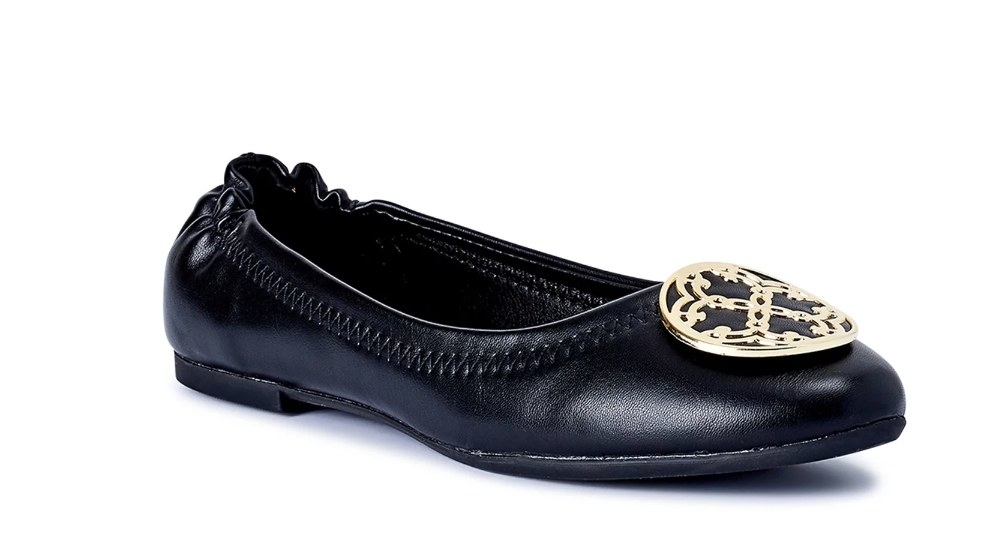 black flats with gold medallion