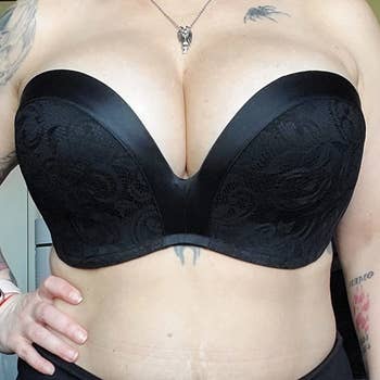 reviewer with 36DDD chest wearing the black bra