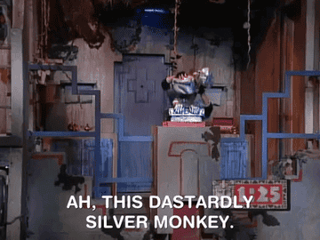 A contestant on the show tries to assemble the silver monkey