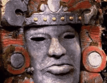 The talking head Olmec moves his mouth up and down