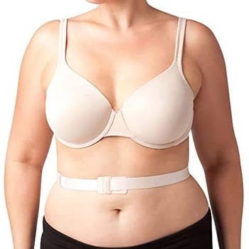 front view of the model showing the straps connect across their stomach
