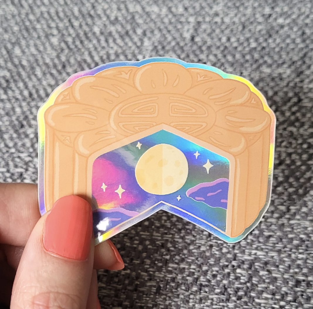 Holographic mooncake sticker with moon as egg yolk in the middle