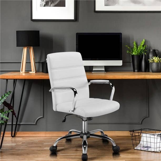 The swivel chair with arms in a home office