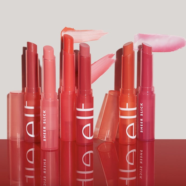 A collection of sheer lipsticks in pinks, reds and oranges