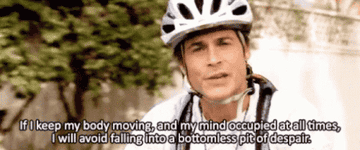 chris rides a bike wearing a helmet. he says &quot;if i keep my body moving and my mind occupied at all times i will avoid falling into a bottomless pit of despair&quot;