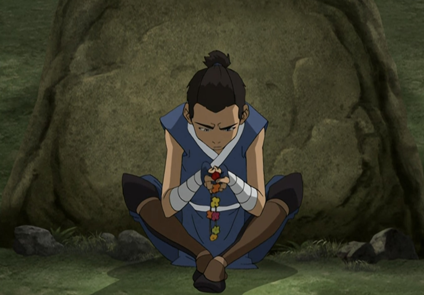 Sokka fiddling with a necklace made out of flowers