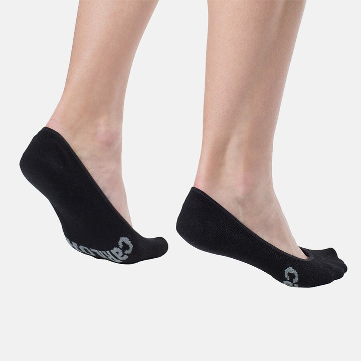 Model wearing black ballet socks