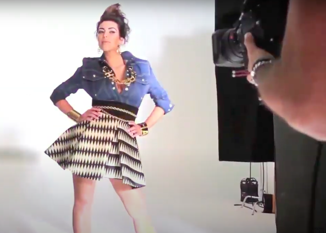 the reality star poses for the camera
