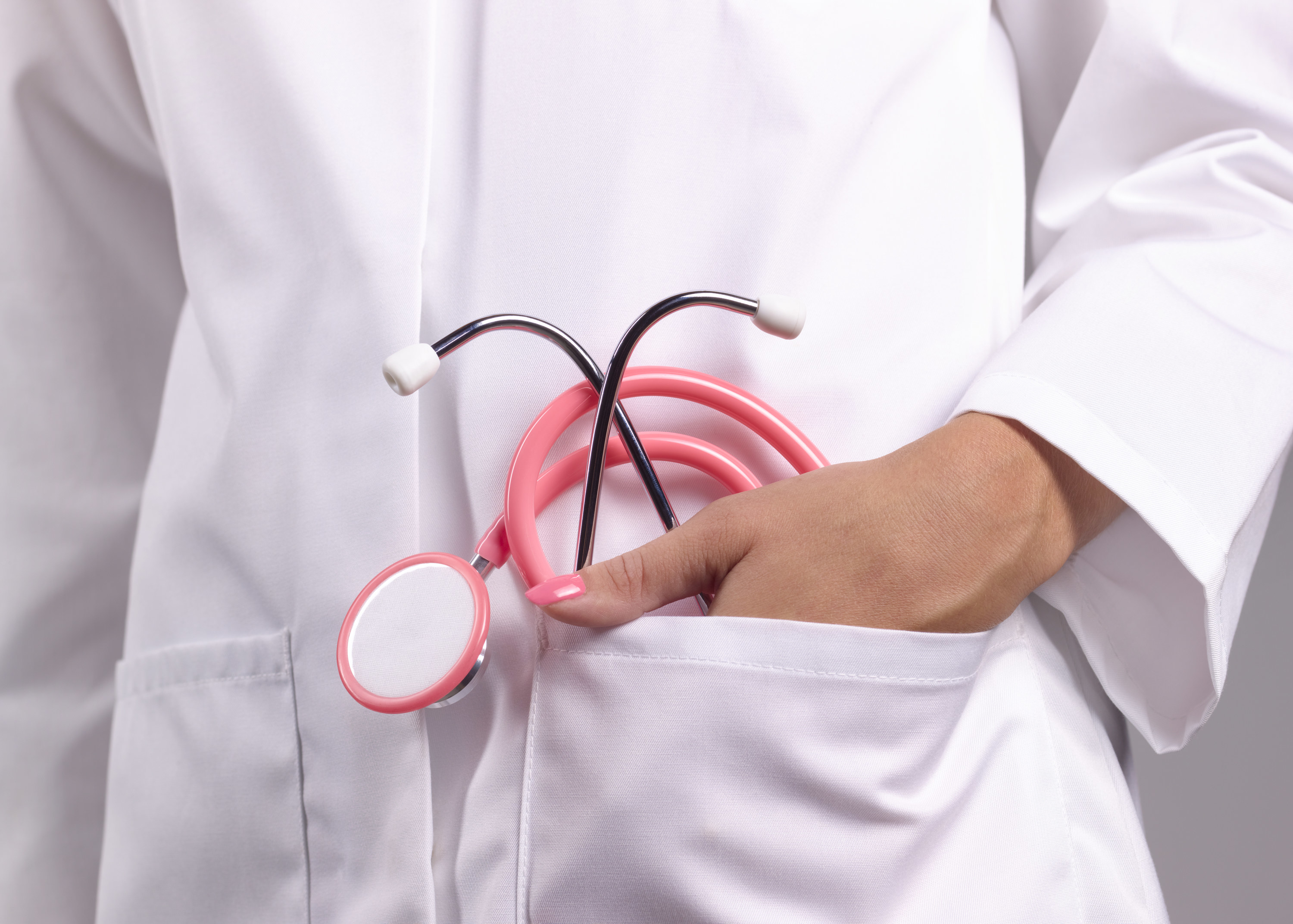 A doctor with a pink stethoscope