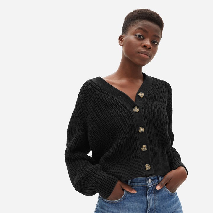 a model wearing the black cardigan