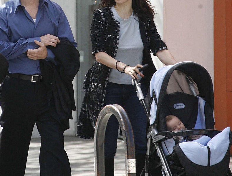 Rachel Weisz and Darren Aronofsky pushing son in stroller