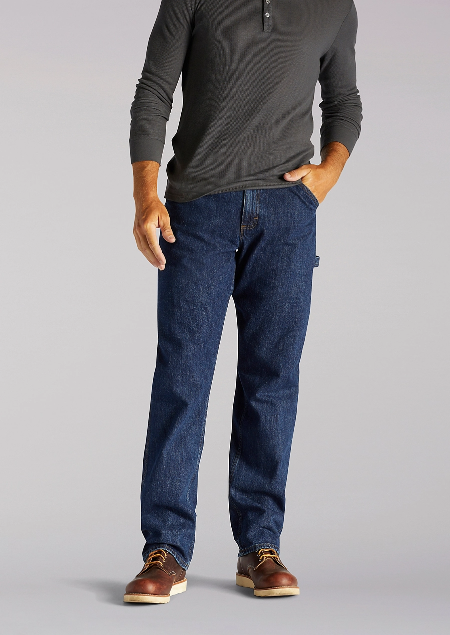 Model wearing the dark blue carpenter jeans
