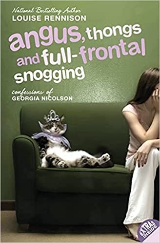 Book cover shows protagonist Georgia and pet cat sitting on a green couch; title text in bold font on top of cover